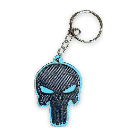 Skull keychain in black with a blue outline