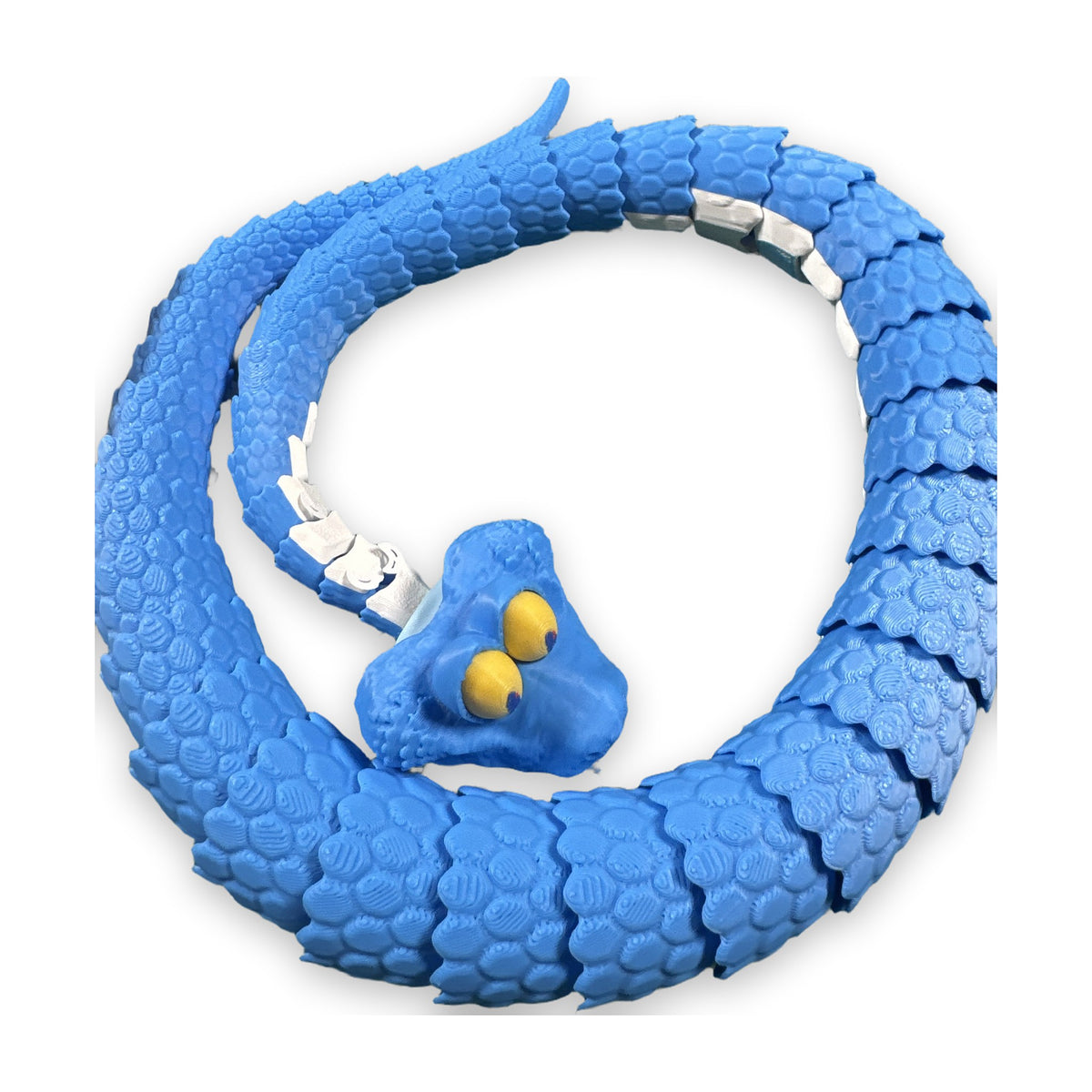 Blue articulated scaled snake with yellow eyes