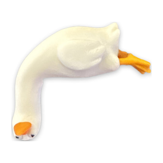 White duck that peeks over a monitor edge