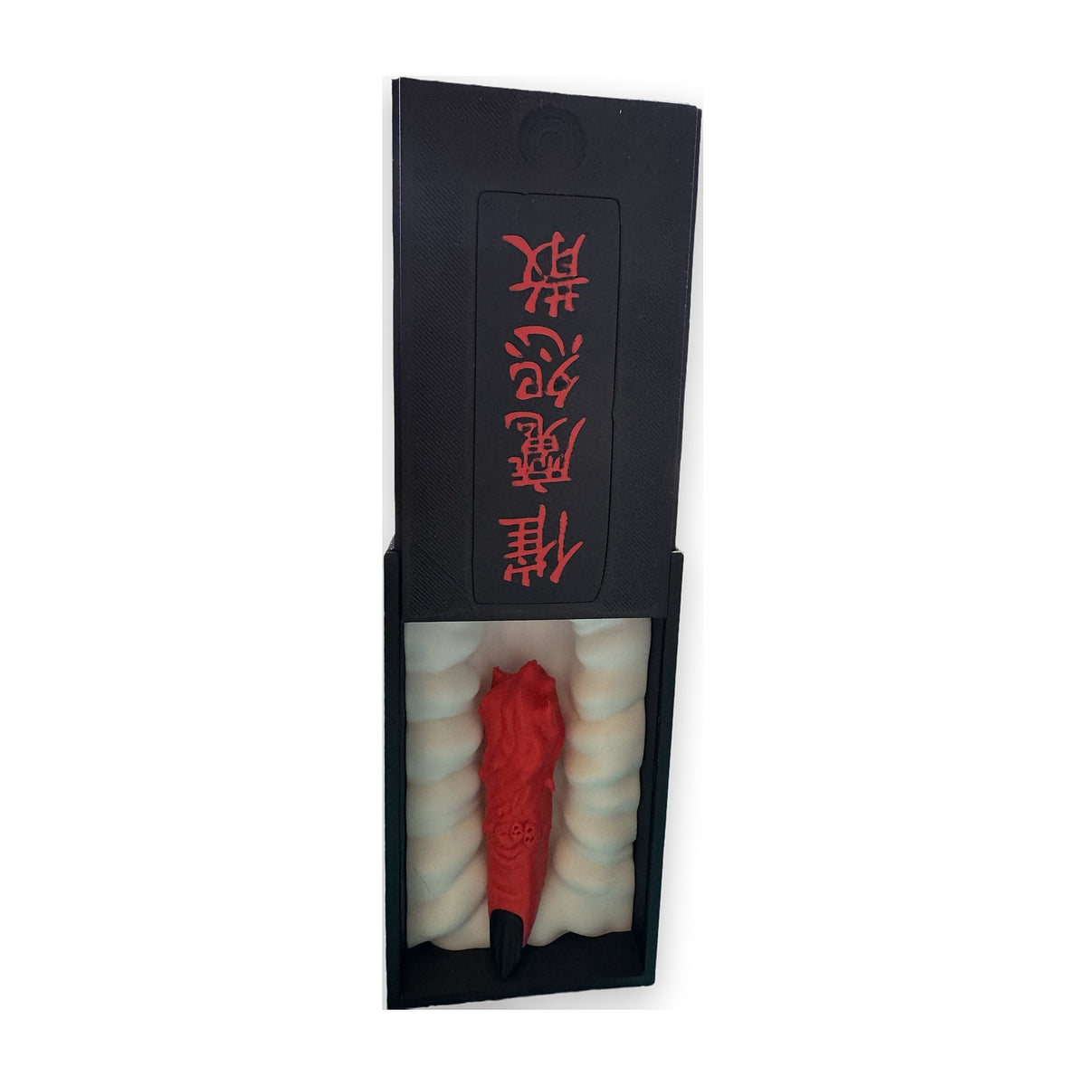 Cursed finger replica in a black sliding box with red kanji lid