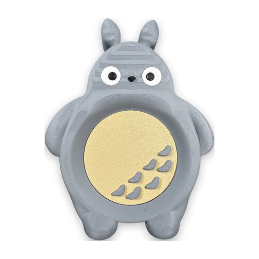 Totoro-shaped tic-tac-toe box with playing pieces inside